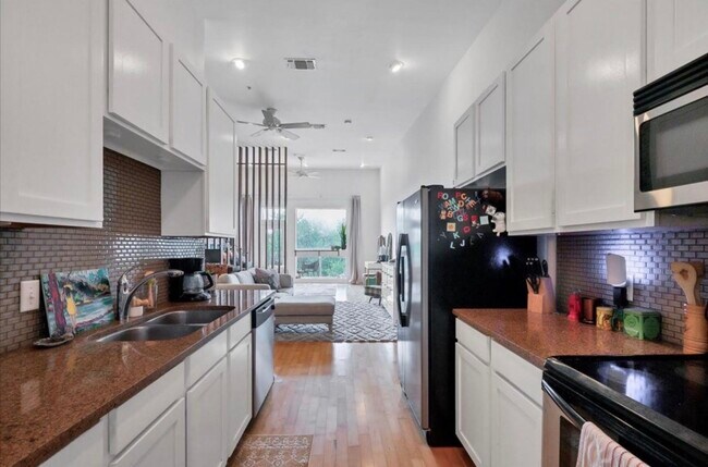 Photo - 2931 E 12th St Unit 2931 E 12th Street #306, Austin, Texas 78702