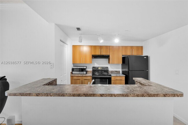 5880 W Sample Rd Unit 203
