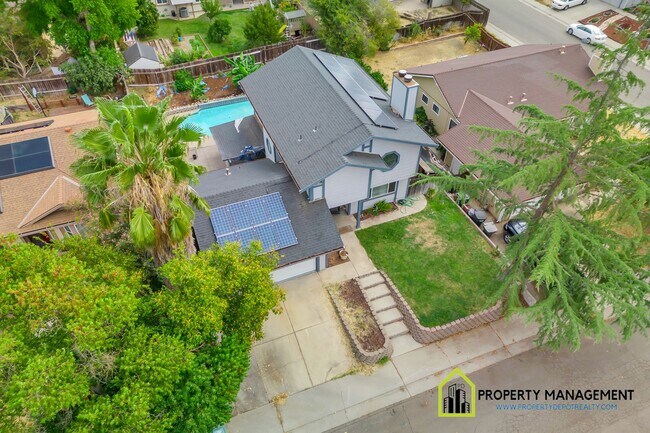 Photo - 4-Bedroom, 2.5-Bath House with Pool & Solar!