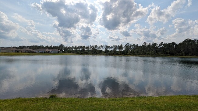 Building Photo - AMAZING POND VIEW! This is a great price o...