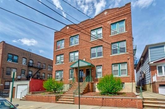 Building Photo - 103 W 49th St Unit 4