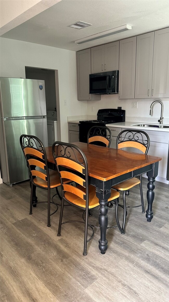 Building Photo - 6200 Ranchester Dr Unit 230