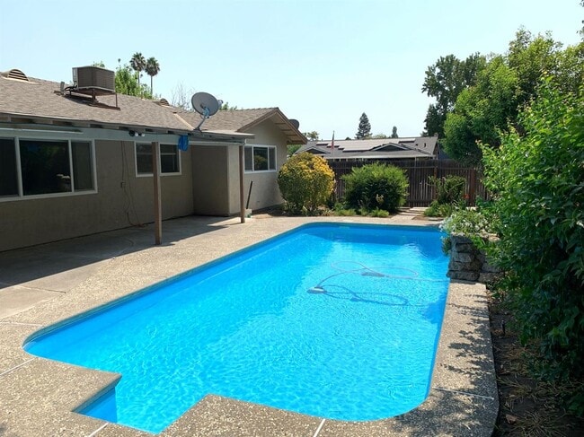Photo - Enjoy the Backyard Pool at This 4-Bedroom ...