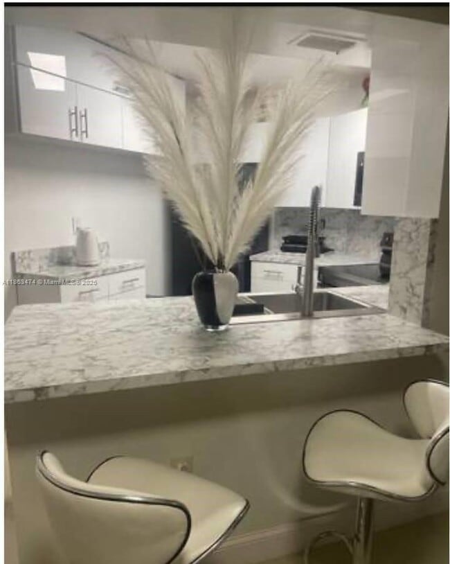 Building Photo - 9715 Fontainebleau Blvd Unit E109 Rental