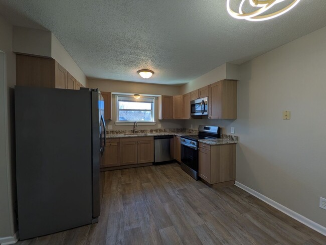 Photo - Pet friendly split-level 3 bedroom, 1 bathroom bi-attached home!