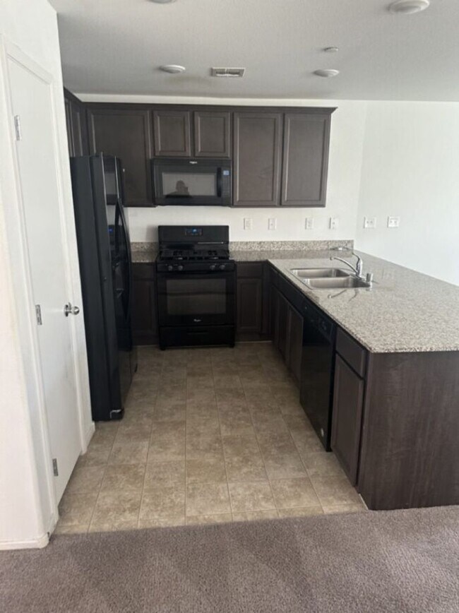 Photo - Townhouse with 2 car garage