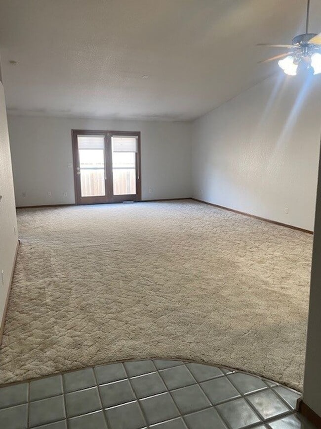 Photo - Spacious 3 Bed 3 Bath Townhome with Finished Basement & 2-Car Garage