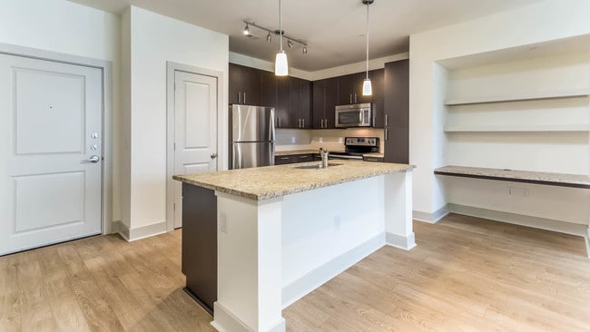 Kitchen with Stainless Steel Appliances and Granite Countertops