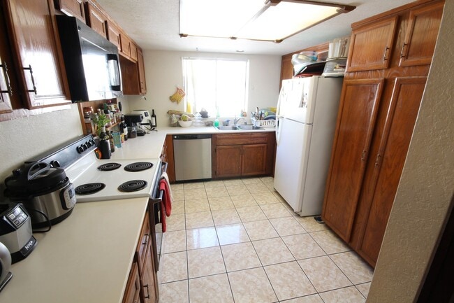 Photo - Spacious 3 Bedroom + Bonus Room Townhome with 2-car garage