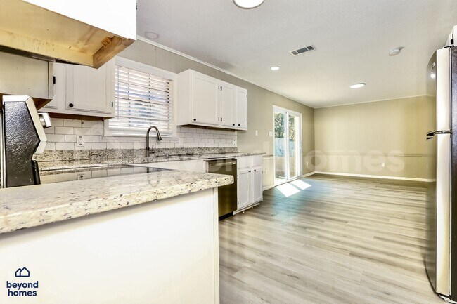 Photo - Beautifully Renovated 4 bedroom / 3 full bath with 1,691 sq feet of space!