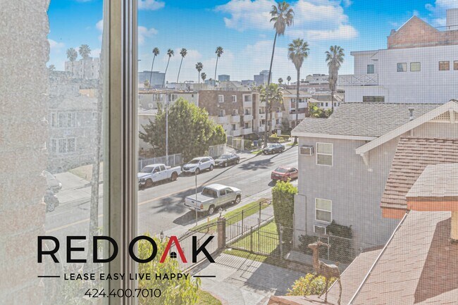 Photo - Welcoming Studio with Large Windows, Hardw... Unit 311