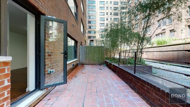 Building Photo - 405 E 56th St Unit 1J Rental