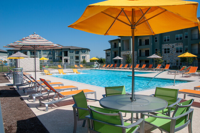 Resort Style Pool & In-Water Lounge Chairs - Mission Trail at El Camino Real Apartments