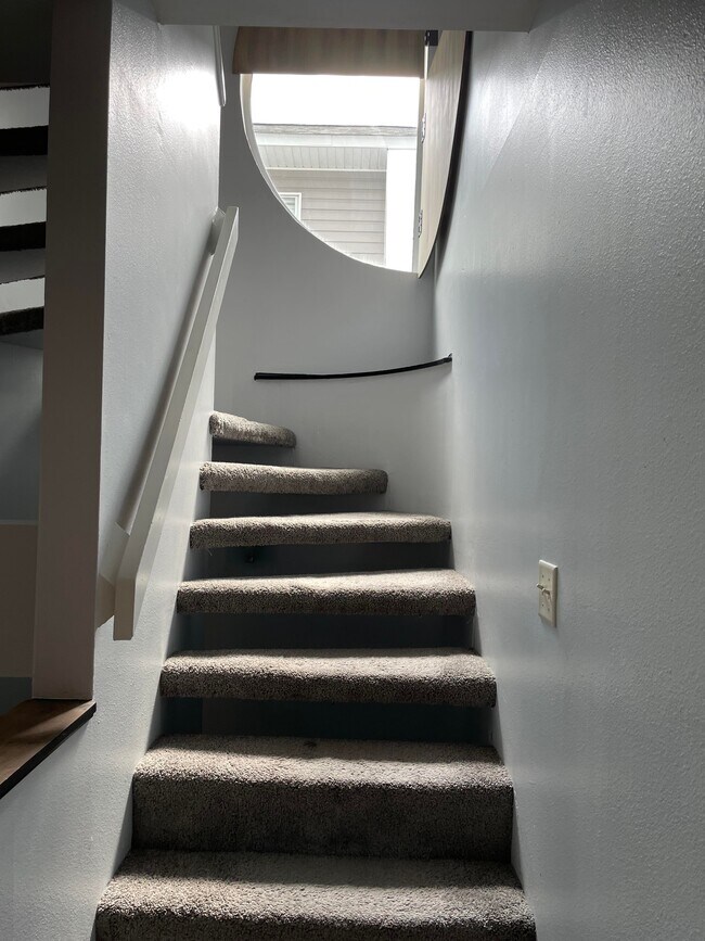 stairs to the second floor - 815 W Pensacola St