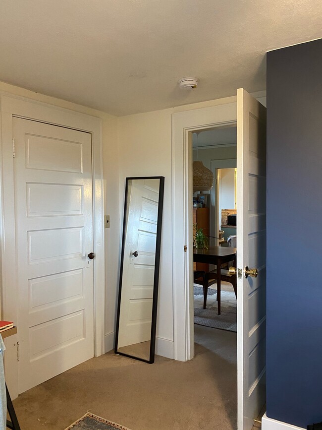 bedroom walk-in closet with shelving - 340 NE Beyrl Ter Apartments Unit 340