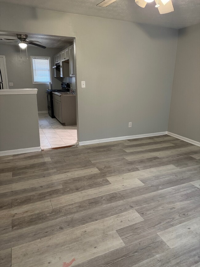 Living Room View - 6486 Raymond Dr Unit Flat Duplex