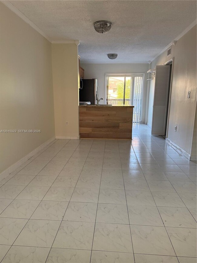 Building Photo - 5490 W 21st Ct Unit 308