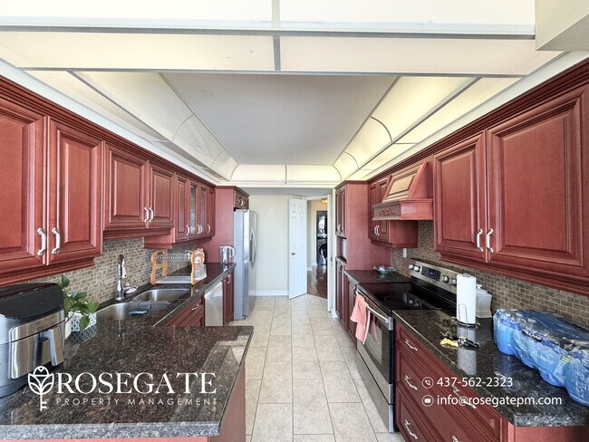 Photo - All-Inclusive 2-Bedroom + Den Corner Condo with Garage & Parking in Brampton Unit 1501