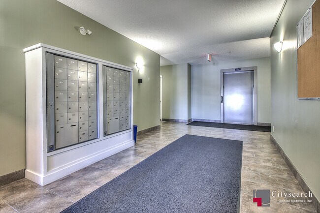 Photo - 5720-212 2 St SW