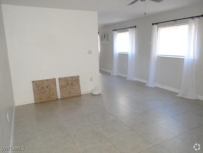 Building Photo - 8093 Country Rd Unit 102 Rental