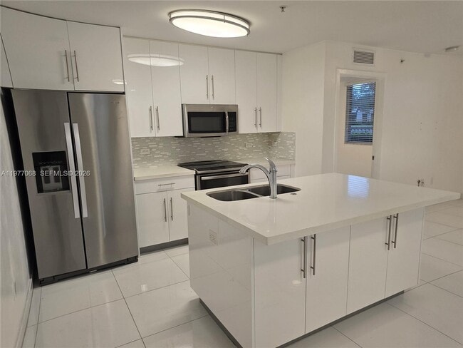 Building Photo - 2651 NE 212th Terrace Unit 103