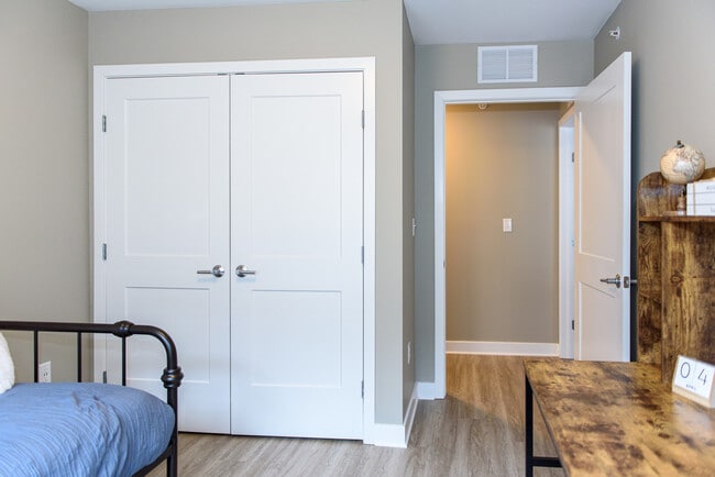 Second bedroom closet area and doorway to hallway