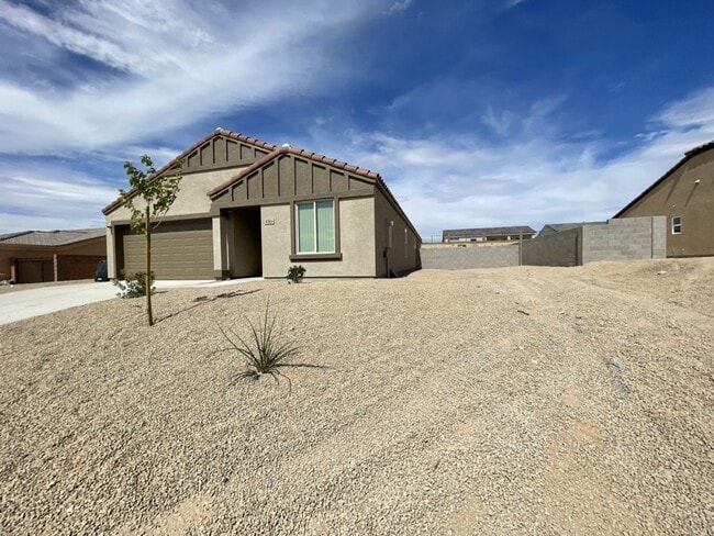 Photo - Coming Soon - 4 bed 2 bath spacious home with garage BHCRENT.COM