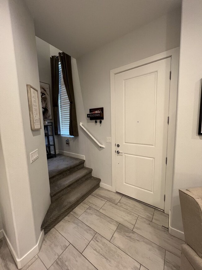 Photo - 3/BD 2.5/BA Sleek Townhome with High Ceilings, Balcony, and Prime Community Amenities!