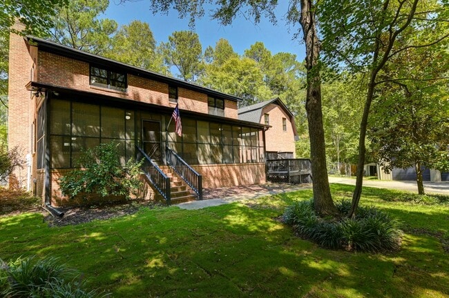 Building Photo - Stunning Home on 5 Acres in Chapin – Top-R...
