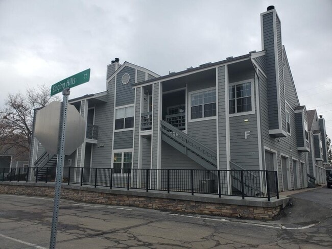 Building Photo - 7477 Singing Hills Dr Unit F101