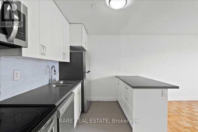 Photo - 3101 Eglinton Ave E Unit 103