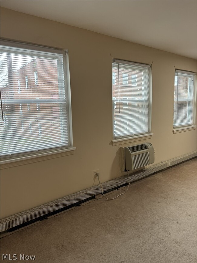 Building Photo - 13781 Cedar Rd Unit 201