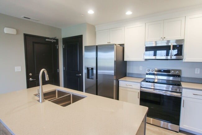 Building Photo - New! Beautiful 1 Bed, 1 Bath Accessible Ap... Unit 2010-205 Rental