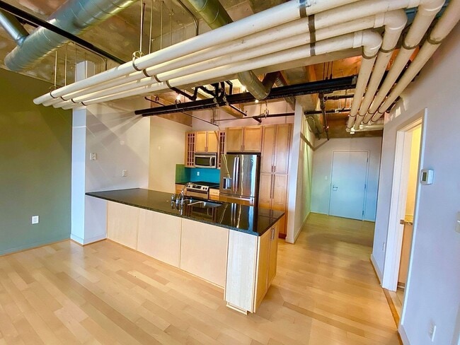 Photo - Stunning Industrial-Contemporary One Bedroom Condo- Parking included!
