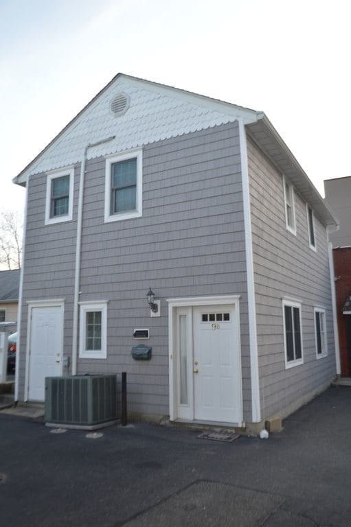 Front view, utility/storage room to the left - 9 Green St Apartments Unit B