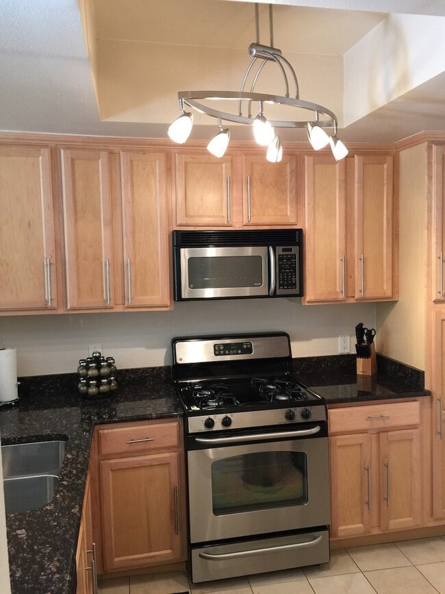 Building Photo - Long or short term available!  Live in lux...