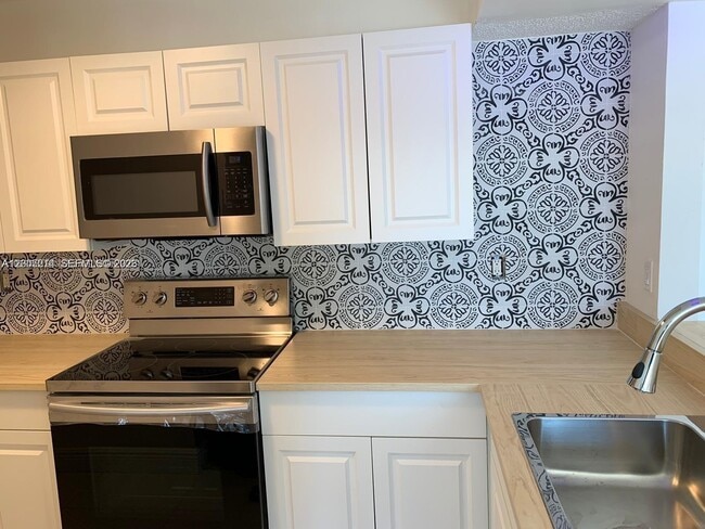 Photo - 8590 SW 212th St Unit 210