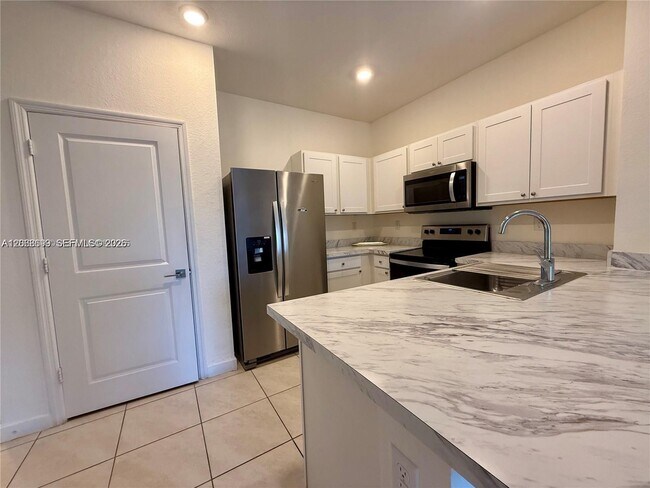Photo - 1100 SW 6th Ct