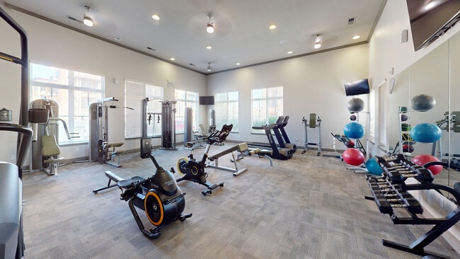Get moving! Your daily dose of fun and energy starts here in our bright, modern fitness center.