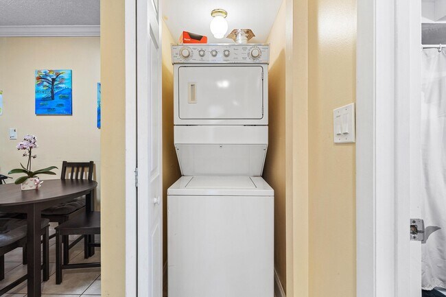 washer and dryer inside condo - 480 NW 20th St