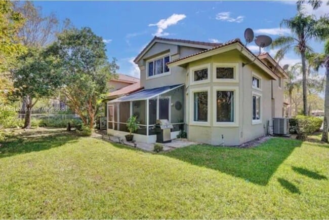 Photo - 12591 NW 57th Pl Unidad TOWNHOUSE