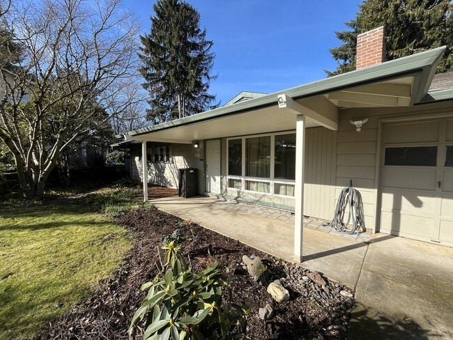 Photo - Classic Comfort: 3-Bed, 1.5-Bath Home with Covered Patio & Deck