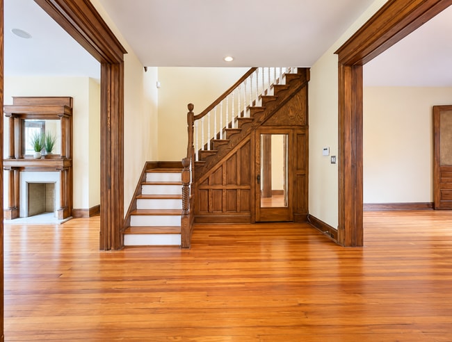 Beautiful original staircase & woodwork showcase the home's historic character. Storage under stairs - 2322 1st St NW