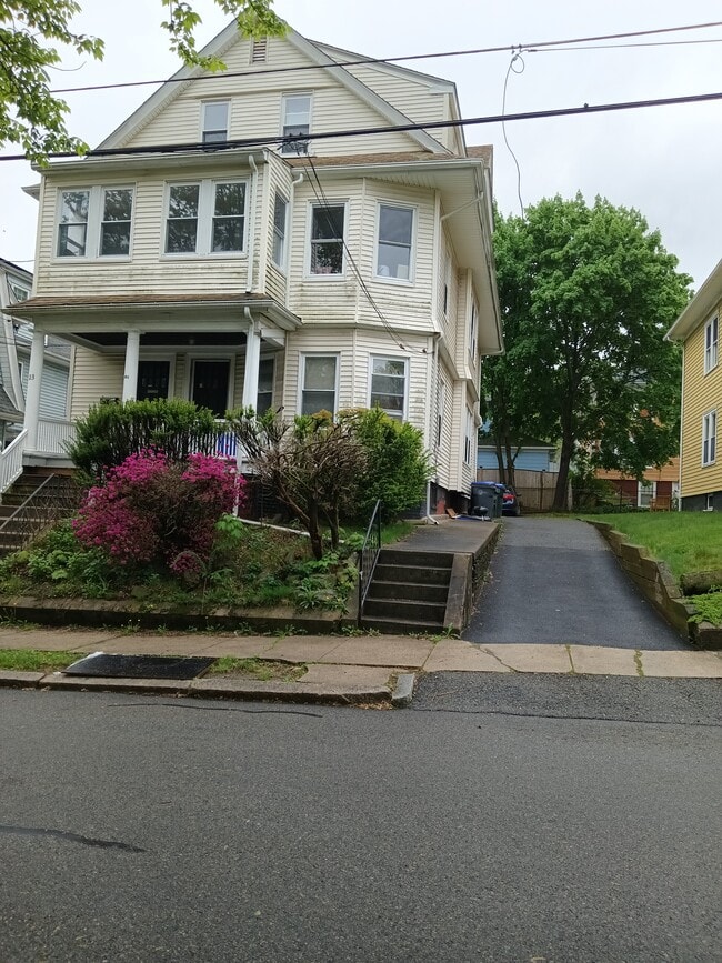 Front view and driveway - 23 Ogden St Apartments Unit #2