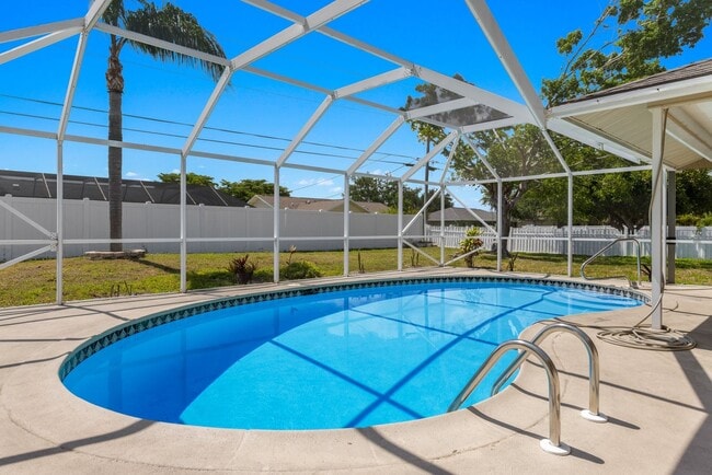 Building Photo - Available Now!  3/2 Pool Home in Southeast Cape