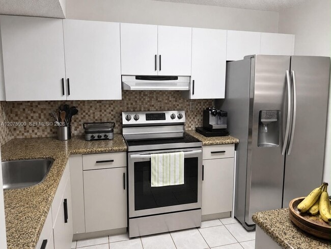 Building Photo - 1195 NW 125th Ct Unit 101