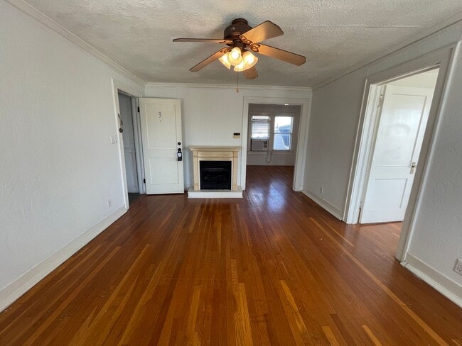 Photo - Charming 1 Bed + Bonus Room Near Cultural District — Hardwoods, Fireplace & Sunroom! Unit 4800 Bryce Ave #3