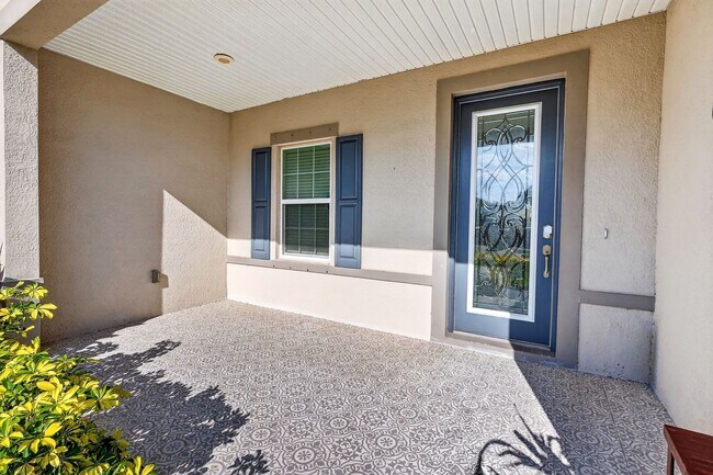 Photo - Modern 4-Bedroom Rental with Screened Patio & 2-Car Garage