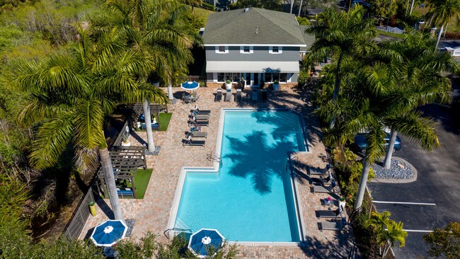 Make our poolside oasis your weekend haven for at-home relaxation. - Somerset Palms Apartments