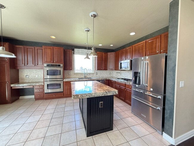Photo - Your Colorado Oasis Awaits! 4 Bed, 3.5 Bath Home with Modern Amenities next to open space